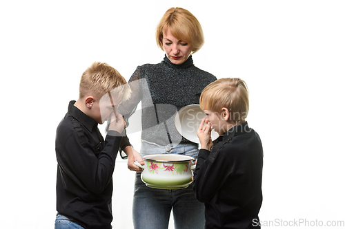 Image of The children did not like the food cooked by their mother