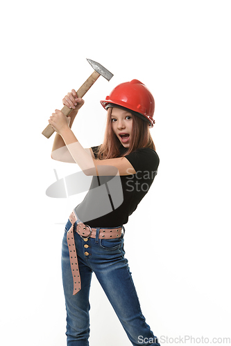 Image of A girl in a hard hat hits herself on the head with a hammer, surprise on her face