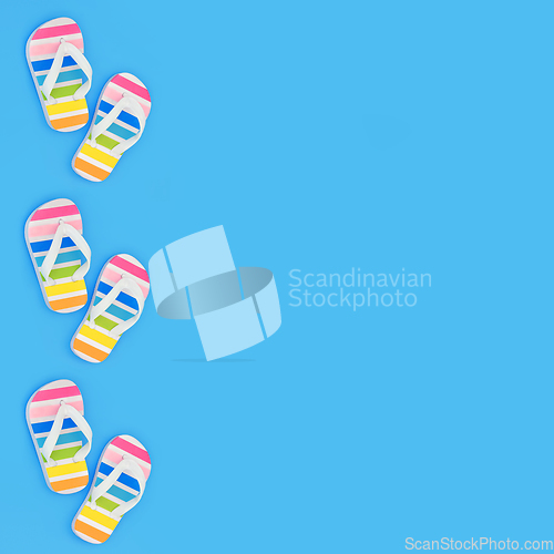 Image of Holiday Time with Rainbow Flip Flops  