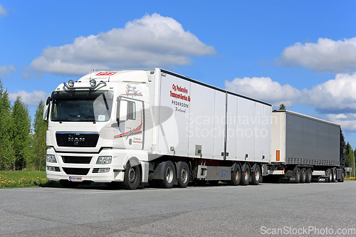 Image of White MAN Truck Semi Trailer Parked on Rest Stop