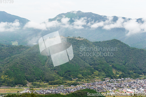 Image of Japanese Takeda Castle on mountain