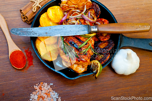 Image of roasted grilled BBQ chicken breast with herbs and spices
