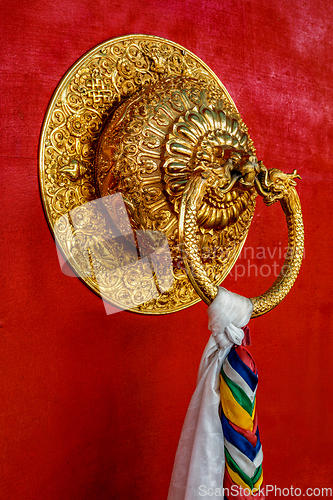 Image of Lion shaped door handle in Buddhist temple