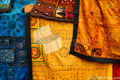Image of Indian fabric with Indian patterns close up.