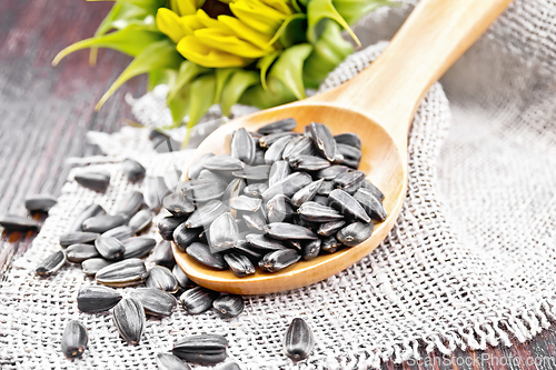 Image of Seeds sunflower in spoon on table