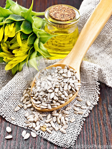 Image of Seeds sunflower peeled in spoon on board