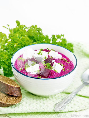 Image of Soup puree of beetroot with feta in bowl on white board