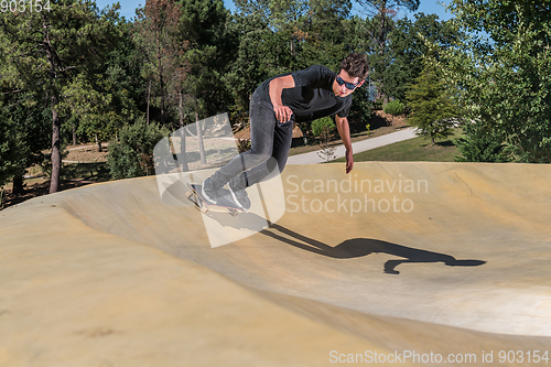 Image of Skateboarder on a pump track park