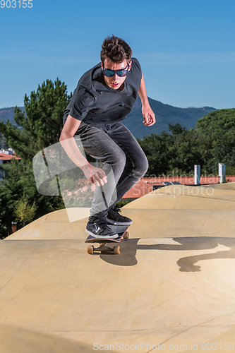 Image of Skateboarder on a pump track park