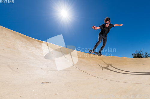 Image of Skateboarder on a pump track park
