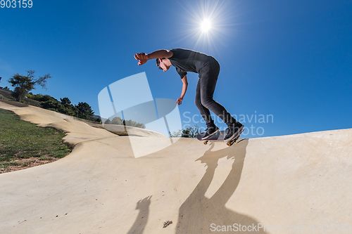 Image of Skateboarder on a pump track park