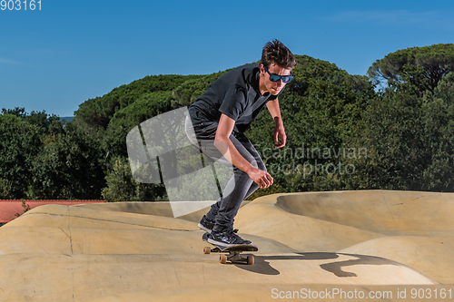 Image of Skateboarder on a pump track park