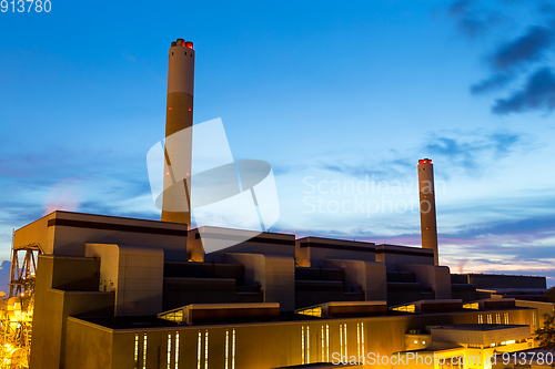 Image of Concrete cement factory at night