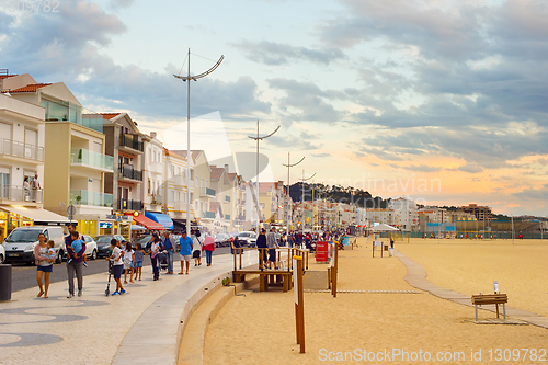 Image of People walking promenade Nazare Portugal