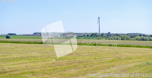 Image of rural scenery with wind turbine