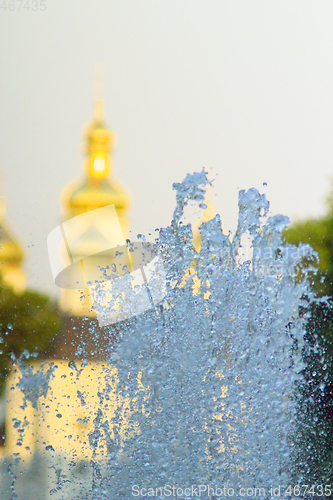 Image of fountains on the background of golden domes