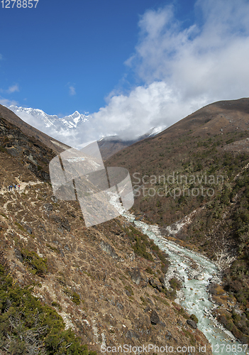 Image of Lhotse summit, trail and river in the Himalayas