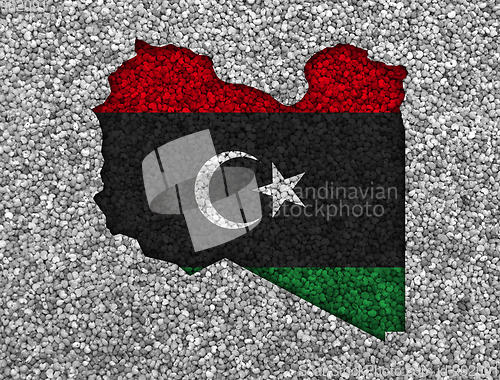 Image of Map and flag of Libya on poppy seeds