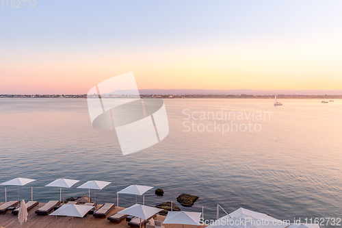 Image of SYRACUSE, ITALY - sunset in front of the sea