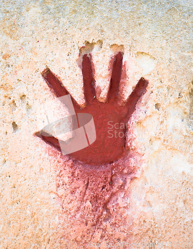 Image of Red hand on stone - graphic gothic element