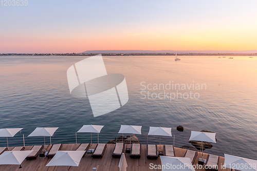 Image of SYRACUSE, ITALY - sunset in front of the sea