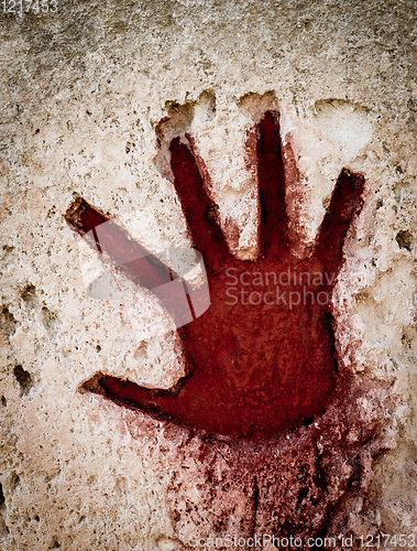 Image of Red hand on stone - graphic gothic element