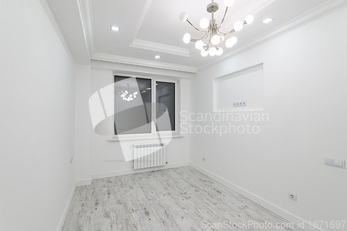 Image of modern white empty room with window