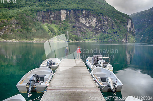 Image of Fisherman in Geiranger fjord of Norway