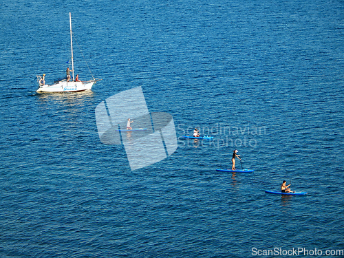 Image of Riding on inflatable boards.