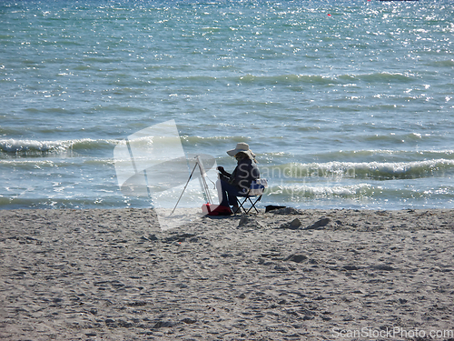 Image of Artist by the sea.