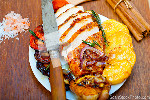 Image of roasted grilled BBQ chicken breast with herbs and spices