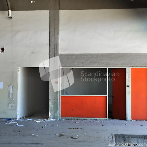 Image of concrete wall and empty room in abandoned factory