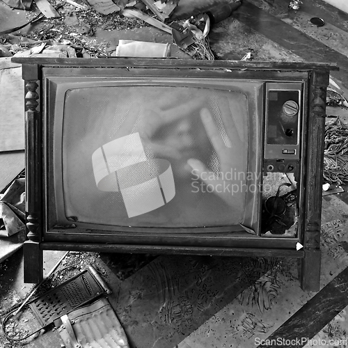 Image of ghostly figure on vintage tv set