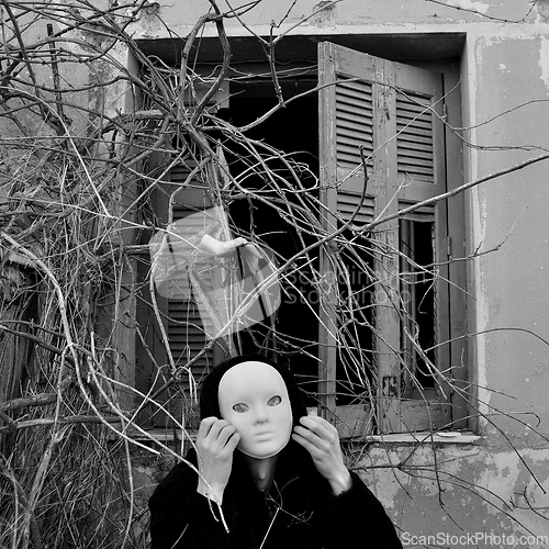 Image of masked figure and overgrown plants