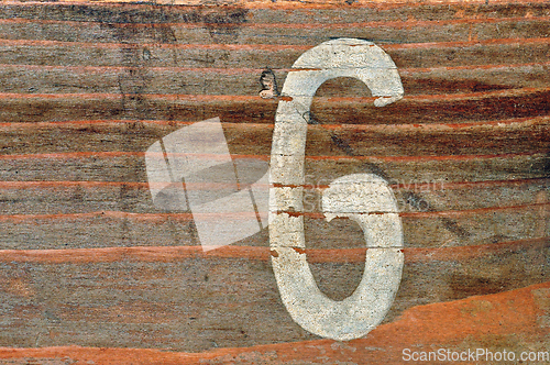 Image of number six wood background