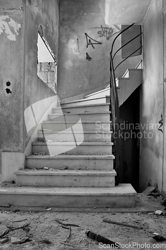 Image of old staircase and dirty floor