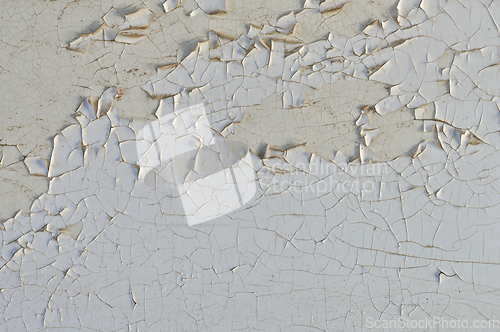 Image of peeling paint white wall
