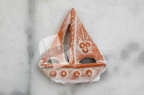 Image of small boat traditional pottery