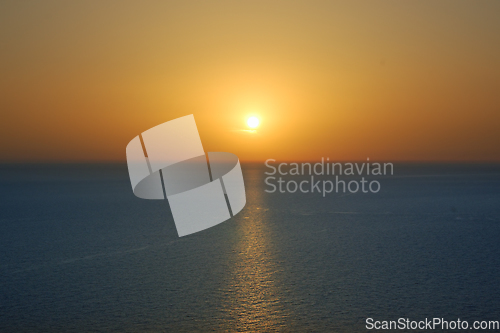 Image of sunset sky and sea horizon