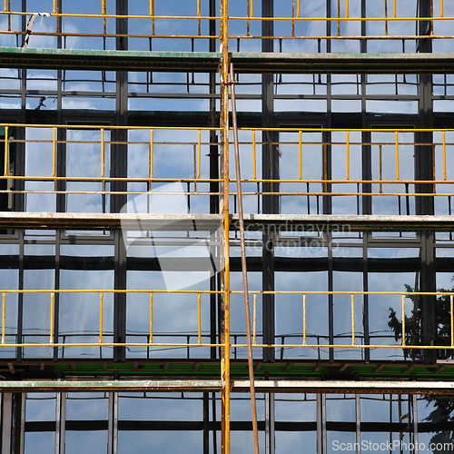 Image of windows and scaffold construction site