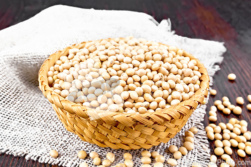 Image of Soybeans in wicker bowl on board