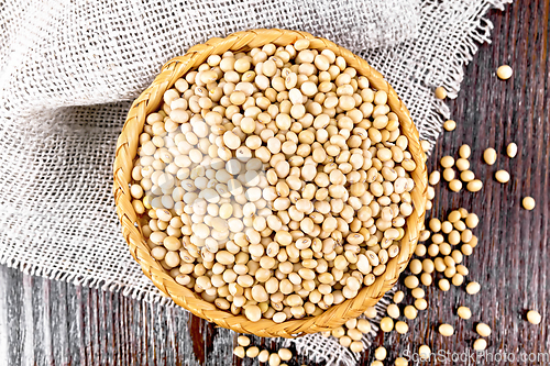 Image of Soybeans in wicker bowl on dark board top