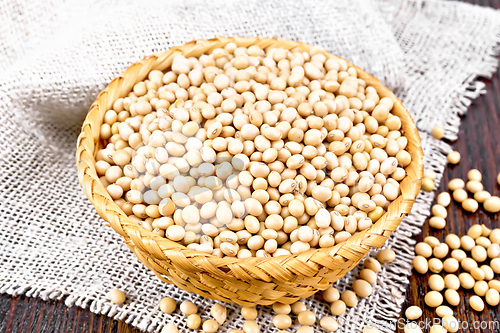 Image of Soybeans in wicker bowl on dark board