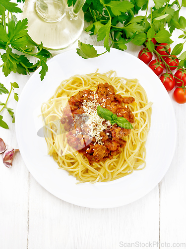 Image of Spaghetti with bolognese on light board top