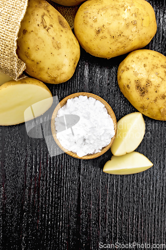 Image of Starch potato in bowl on dark board top