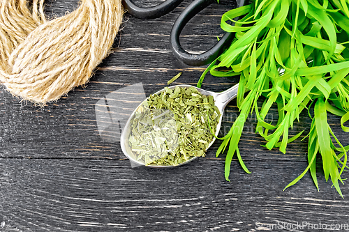 Image of Tarragon dried in spoon on board top