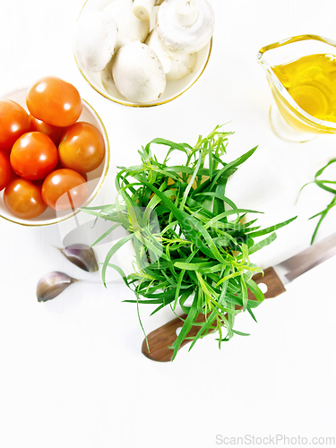 Image of Tarragon in mortar on board top