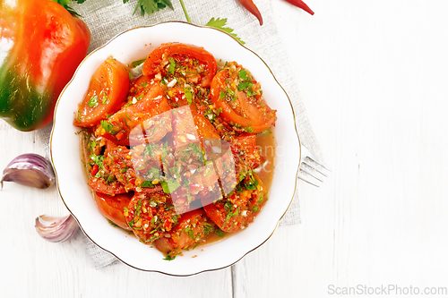 Image of Tomatoes Korean in plate on board top