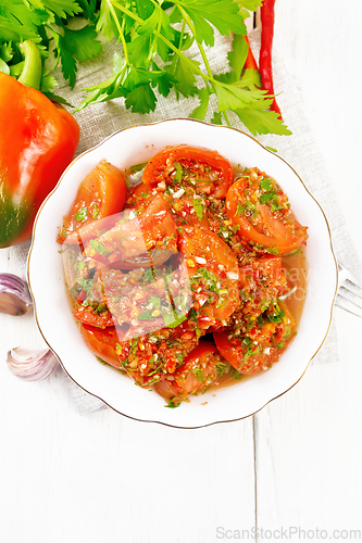 Image of Tomatoes Korean in plate on light board top