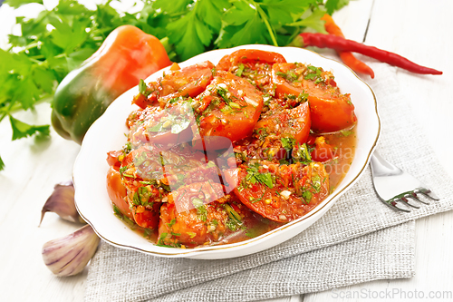 Image of Tomatoes Korean in plate on napkin